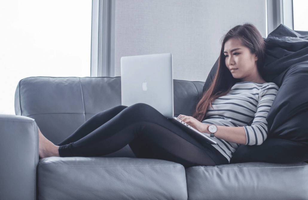 asian girl using laptop